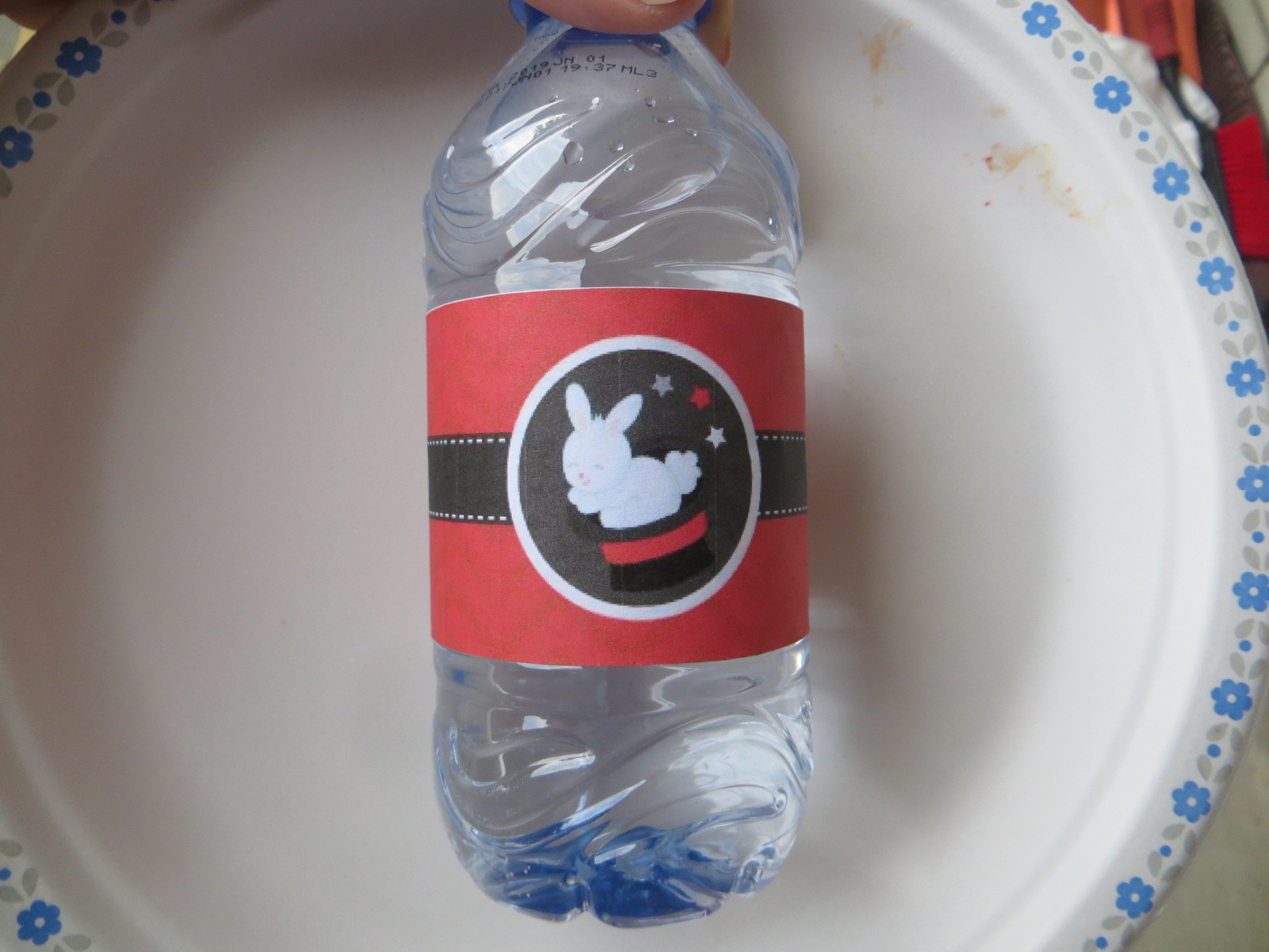 Water bottle with cute home made magic theme label.